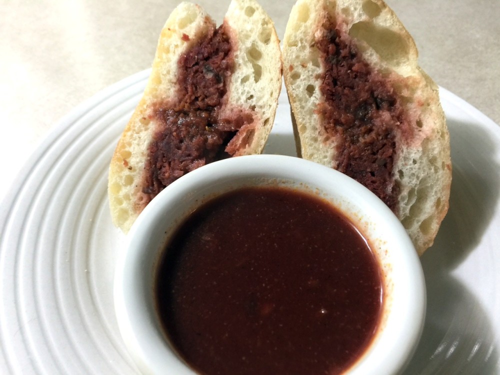 BLOOD RED SAUSAGE MEATBALL SANDWICH WITH KALAMATA RED GRAVY DIP